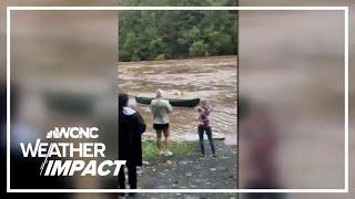 Caught on cam: Man risks life to save woman from raging floodwaters