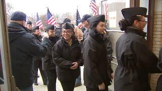 US Navy recruits from Naval Station Great Lakes surprised with Christmas celebration