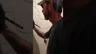 How to carve vertical concrete. Instructional concrete carving in a shower.