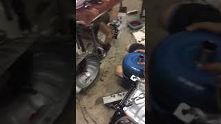 Installing torque converter into a Ford C4 transmission