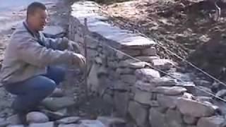 Create your own New England Fieldstone Stone Wall masterpiece with this step-by-step guide.