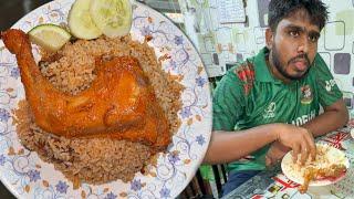 Eating Tehari with Chicken Roast