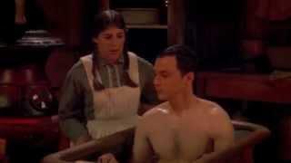 Amy gives Sheldon a bath