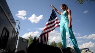 Trick riders show their skills at a Montana rodeo