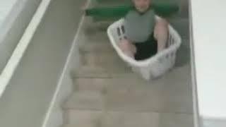 Kid Regrets Decision of Sliding Down Stairs in Laundry Basket - 1040639