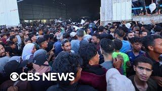 Multiple Palestinians died as hundreds rush for food in Gaza, health officials say