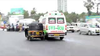 Ambulance rams bike riders at traffic signal