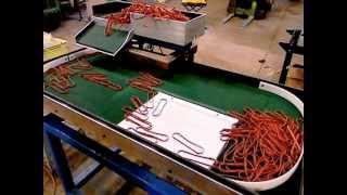 Vibratory System for Separating Rubber Gaskets for Robotic Loading by Roboshop Inc