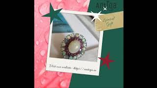 Handcrafted ring studded with Ruby and Opal.