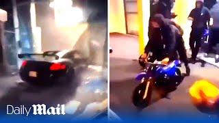 France riots chaos: Stolen supercar rams store and looting of motorbikes