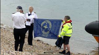 National Coastwatch 30th Anniversary celebration flag arriving at Lee on Solent - Sun 21 July 2024