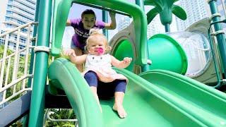 Maggie Plays on the playground with baby brother!