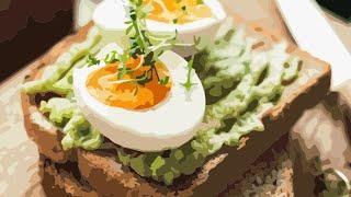 Eating Delicious Toast With Guacamole And Eggs For Dinner In Tunisia
