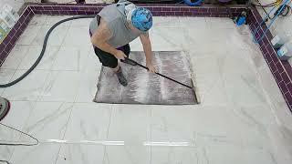 Dirty red Persian Hand Knotted rug getting a serious Arcadia Rug Spa Clean.