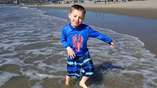 Young Kids Playing in the Ocean at Mission Beach San Diego