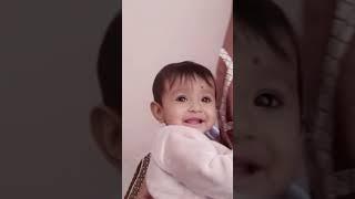 My cute Ruhi is doing bhau with curtain...