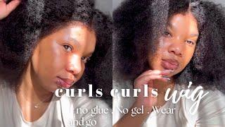 THIS IS A NATURAL HAIR WIG |ITS GIVING VOLUME FT CURLS CURLS