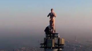 Dubai Burj Khalifa top Emirates 'flight attendant' filmed on top of the