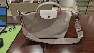Longchamp changed Le Pliage Cuir AGAIN in 2023. Goodbye, Metis leather! Hello, Cowhide. 