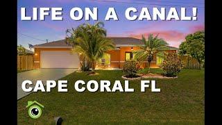 LIFE ON A CANAL.  CAPE CORAL HOME WITH WATER IN THE BACK - 2021