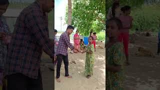 Bucket Ball Challenge: Village Women Skillfully Drop Balls into Rotating Buckets food gamegame