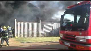 Firefighters extinguishing fire at EMPD Impound in Boksburg