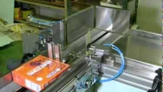 Chie Mei- Over wrapping machine with stacker for box packing