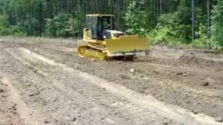 new komatsu D39 dozer pushing dirt