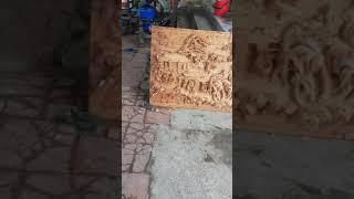 Tranh gỗ tiến xuân