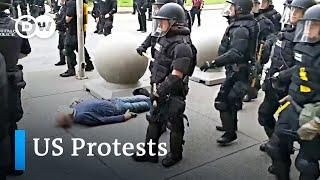 Police officer suspended after shoving elderly protester to the ground | US protests