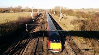 Train running under the Icknield Way footbridge at Icleford