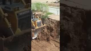 Bulldozer pushing dirt Clearing