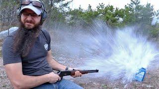 Shooting soap jugs filled with water.