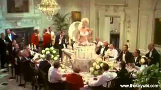 Virna Lisi - emerges from the cake