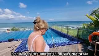 the TRIBE HOTEL in kuta bali indonesia is rt infront of the beach with lots of surfing.