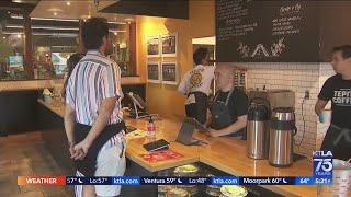 Holiday shoppers supporting local businesses on Small Business Saturday