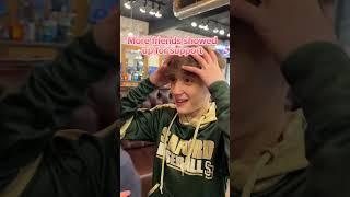 2 kids spin the wheel at BARBERCHOPS