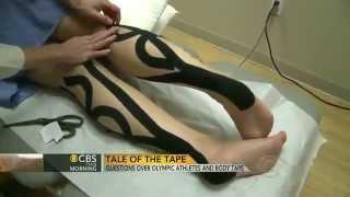 CBS. Репортаж о кинезиотейпировании в спорте "Olympic athletes trend Body tape".