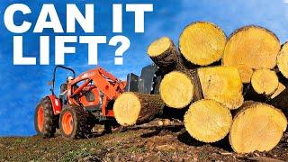 MASSIVE FREE LOG PILING with the Kioti DK 4710 hst tractor!