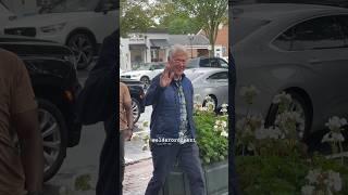 Former President Bill Clinton all smiles as he enters a bookstore in the Hamptons yesterday morning