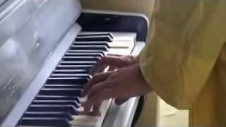 Yuri playing piano in abandoned Pripyat apartment (Chernobyl )