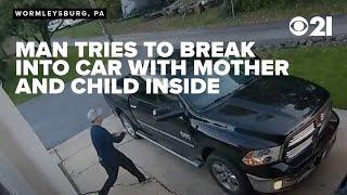 CAUGHT ON CAMERA: Man tries breaking into mother's car while she and her 6-year-old are inside