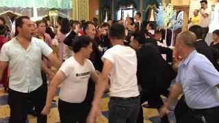 Uyghur Men Dancing in a Wedding Party in Kashgar Xinjiang