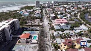 Siesta Key residents cleaning up after Milton, grateful storm wasn't worse