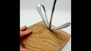An Orchid hand-crafted from recycled cutlery. 