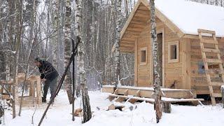 winter work inside my log cabin , unusual walls made with an axe