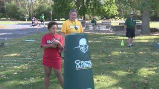 Packers return to Syble Hopp to host Football Outreach Camp for students