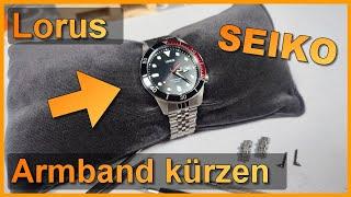 Gefaltetes Uhren-Armband von Seiko/Lorus kürzen (Stifte mit Pfeil)