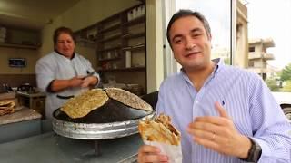 Delicious Lebanese Breakfast: Flatbread SAJ Manakish. Traditional Village Food