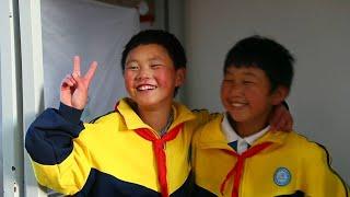 China's "frost boy" goes to new school